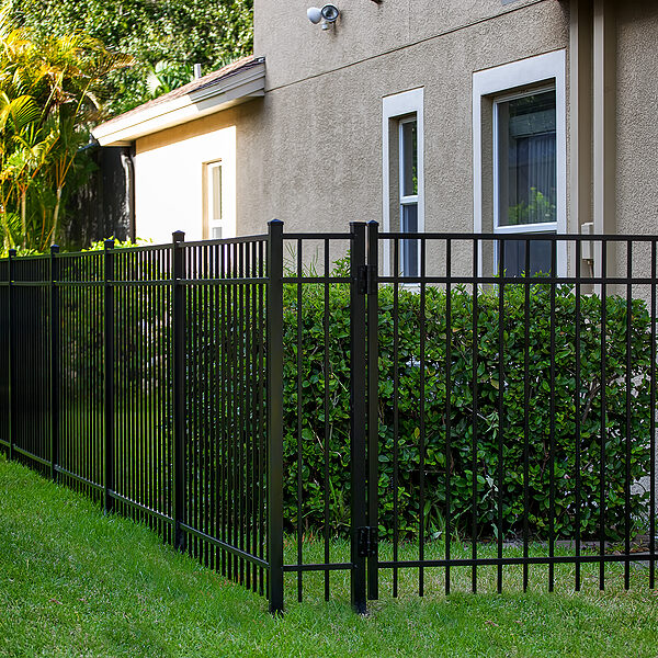a house with aluminum fence